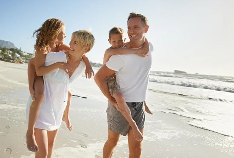 happy family on the beach happy family on the beach